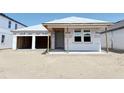 New construction home with a 2-car garage, covered entryway, and basic framing, ready for customization at 30166 Rustic Mill Street, Mount Dora, FL 32757