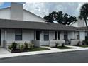 Inviting condo with tidy landscaping and painted brick at 3120 Plaza Terrace Dr # 3120, Orlando, FL 32803