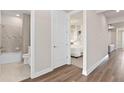 Stylish bathroom with tile shower, seamlessly connected to the light-filled primary bedroom at 1562 Timber Leaf Rd, St Cloud, FL 34771