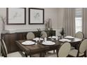 Elegant dining room featuring a wooden table, stylish chairs and decor at 3005 Namaste Dr, Clermont, FL 34714