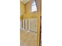 Bright, tiled foyer with a high ceiling and natural light, showcasing the home's welcoming entrance at 3222 Reserve Ct, Orlando, FL 32825