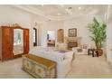 Spacious living room featuring a fireplace, large windows, and elegant decor at 3429 Regal Crest Dr, Longwood, FL 32779