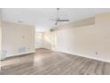 Spacious living room featuring modern flooring, neutral walls, and plenty of natural light at 3224 Holland Dr, Orlando, FL 32825