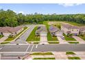 Aerial view of the neighborhood showcasing well-maintained lawns and community green spaces at 336 Pelham Park Dr, Deland, FL 32720