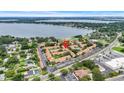 Aerial view of the community, highlighting its proximity to the lake and recreational facilities at 5323 Hansel Ave # E14, Orlando, FL 32809