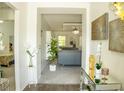Bright living room showcasing contemporary decor and plush seating, creating an inviting atmosphere at 608 Washington Way, Haines City, FL 33844