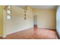 Spacious living area with tile flooring, recessed lighting, and a neutral color scheme, ready for personalization at 611 Jura Ln, Kissimmee, FL 34759