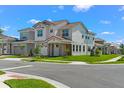 Beautiful single-Gathering home features manicured landscaping, a two-car garage, and sidewalk at 8106 Mabury Ln, Orlando, FL 32832