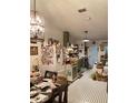 Spacious kitchen with checkered floors, a large island and plenty of storage at 1022 Love Ln # 35, Apopka, FL 32703