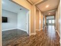 Inviting hallway featuring wood-style floors and neutral paint creating an airy feel at 1540 Orange Valley Rdg, Ocoee, FL 34761