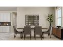 Open dining room with a wooden table, six chairs, decorative mirror and a plant near the window at 5656 Vinyasa Rd, Clermont, FL 34714