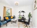 Inviting living room featuring modern decor, stylish furniture, and ample natural light at 9106 Cut Shot Dr, Winter Garden, FL 34787