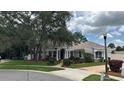 Attractive single story home featuring well-maintained landscaping and a welcoming entrance at 1586 Antoinette Ct, Oviedo, FL 32765