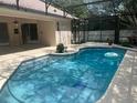 Sparkling screened-in pool with a spacious patio area, perfect for outdoor entertaining and relaxation at 1586 Antoinette Ct, Oviedo, FL 32765