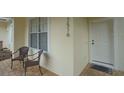 Inviting porch with brick flooring and comfortable seating at 17516 Blessing Dr, Clermont, FL 34714