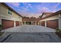 Expansive garages with multiple bays and a connecting breezeway, offering ample parking and storage space at 3461 Michigan St, Lake Mary, FL 32746