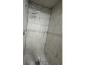 Modern shower featuring sleek gray and white tile work and contemporary fixtures at 4674 Pembrook Pl # J 101, Orlando, FL 32811