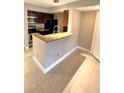 Kitchen featuring granite countertops and stainless steel appliances at 5116 Conroy Rd # 411, Orlando, FL 32811