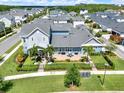 Stunning aerial view of the property, showcasing the backyard, patio, and surrounding neighborhood at 14366 Walcott Ave, Orlando, FL 32827