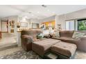 Open-concept living space flowing into the kitchen, perfect for modern living and entertaining at 2142 Woodbridge Rd, Longwood, FL 32779