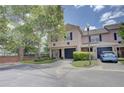 Inviting townhome with a well-maintained front yard and convenient garage parking at 2901 Ashford Park Pl, Oviedo, FL 32765