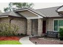 Charming single-Gathering home with brick exterior, mature trees, and a well-maintained lawn at 687 N Endeavour Dr, Winter Springs, FL 32708