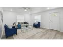 Bright and airy living room featuring modern furniture and stylish decor at 1002 Cypress Ave, Sanford, FL 32771