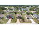 Neighborhood view of well-spaced homes, each with unique features and landscaping at 257 Fig Ct, Kissimmee, FL 34759