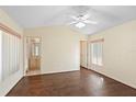 Spacious main bedroom featuring hardwood floors and an ensuite bathroom at 40 Hollow Pine Dr, Debary, FL 32713