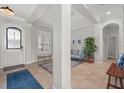Spacious foyer with decorative rug, light gray walls, and ample natural light at 4221 Isle Vista Ave, Belle Isle, FL 32812