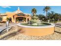 Beautiful view of the community clubhouse with fountain, 'Regal Palms Bar-Restaurant-Spa' signage at 487 La Mirage St, Davenport, FL 33897