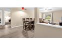 Open floor plan showcasing the dining room and living room, creating an inviting space at 4102 Plantation Cove Dr # 201, Orlando, FL 32810