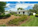 Well-maintained front yard with lush greenery and manicured landscaping provides great curb appeal at 111 Woodstream Ct Ct, Maitland, FL 32751