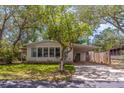 Charming single-story home with a covered carport and well-maintained front yard at 116 E Plantation Blvd, Lake Mary, FL 32746