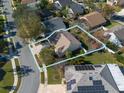 Aerial view of a single-Gathering home showcasing the property lines, backyard, and surrounding neighborhood at 1662 Canoe Creek Rd, Oviedo, FL 32766