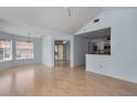 Bright and airy living room with open floor plan, and durable wood floors at 685 Youngstown Pkwy # 300, Altamonte Springs, FL 32714