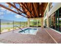 Relaxing spa with a beautiful lakeside view at 8865 Se 119Th St, Summerfield, FL 34491