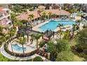 Luxurious community pool with ample lounge seating and a covered pavilion at 5012 Shoreway Loop # 10107, Orlando, FL 32819