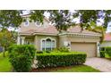 Beautiful home featuring a well-manicured lawn and a classic architectural design at 8108 Via Bella Notte, Orlando, FL 32836