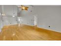 Bright living room with hardwood floors and neutral walls, offering a versatile space at 1117 Park Green Pl, Winter Park, FL 32789