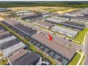Community aerial view showcasing private pools and well-planned layouts at 1292 Blue Island Dr, Clermont, FL 34714