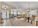 Bright living room with lots of space, carpet flooring, ceiling fan, and lots of natural light at 14654 Lady Victoria Blvd, Orlando, FL 32826