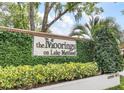 Community entrance sign that reads The Moorings on Lake Maitland at 204 Quayside Cir # 601, Maitland, FL 32751