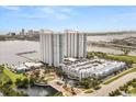 Community with a water feature and bridge to parking garage and water views at 241 Riverside Dr # 902, Holly Hill, FL 32117