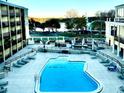 Inviting outdoor pool and lounge area, perfect for relaxation and enjoying the community amenities at 151 E Washington St # 508, Orlando, FL 32801