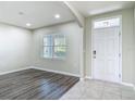 Home entryway featuring fresh paint and flooring at 3975 Silverstream Ter, Sanford, FL 32771