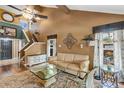Cozy living room with high ceilings, decorative accents, and ample natural light at 887 Reedy Cv, Casselberry, FL 32707