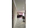 View of the hallway leading to the spacious living room at 1637 Mistflower Ln, Winter Garden, FL 34787