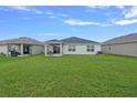 Large backyard perfect for outdoor activities and relaxation at 232 Summerlin Loop, Haines City, FL 33844