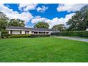 Well maintained lawn, clean front exterior, and driveway parking at 2809 Sanbina St, Winter Park, FL 32789